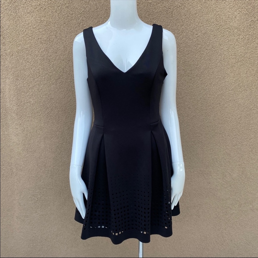 Bebe black little dress sleeveless size small -  full skirt - no noted flaws